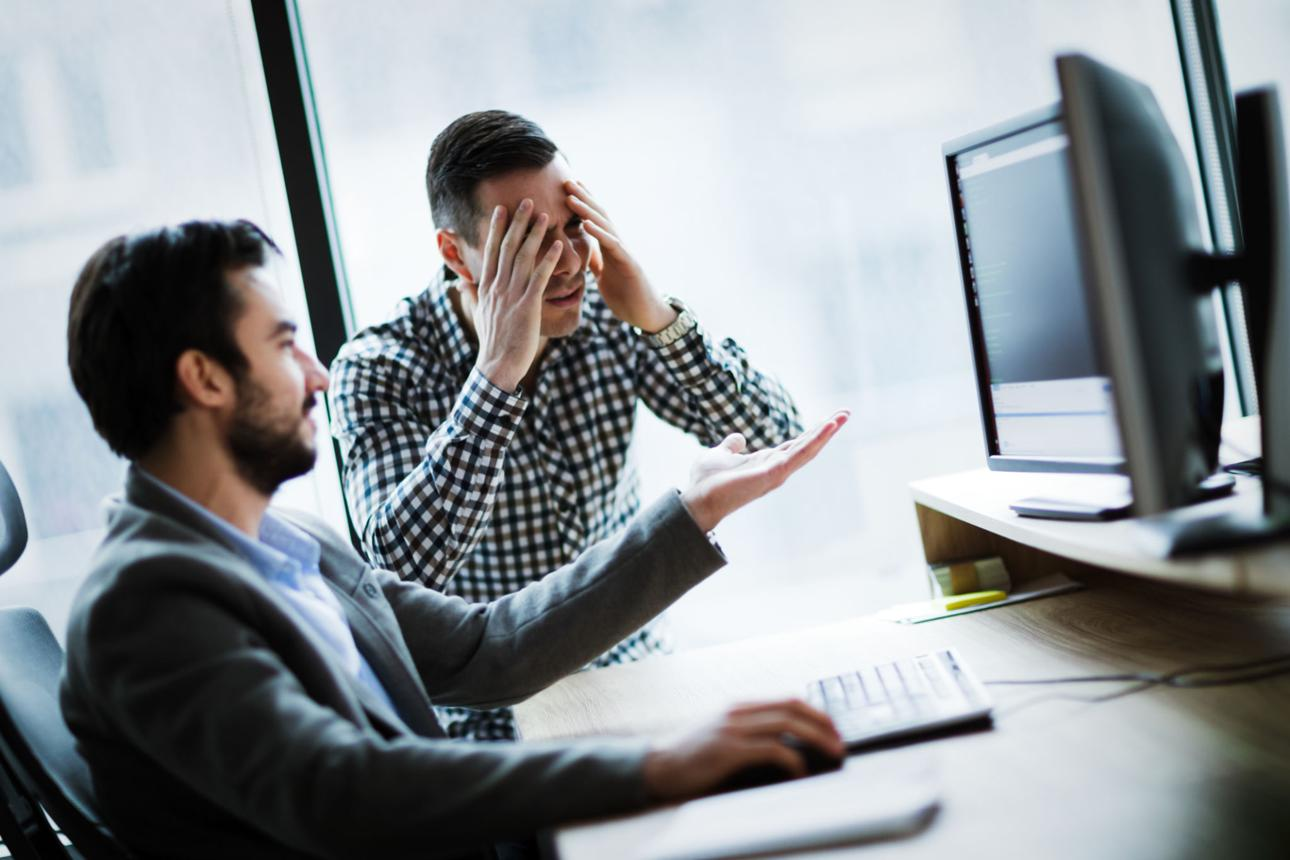 A team member turning to a colleague to ask a question